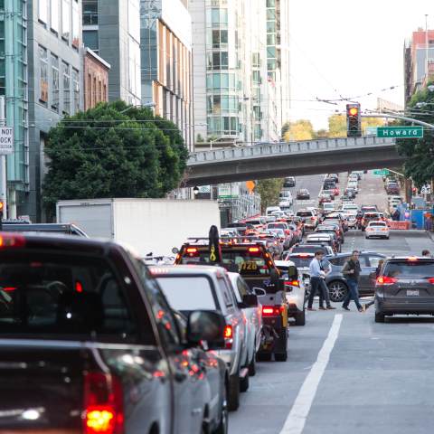 Many cars lined up on the road