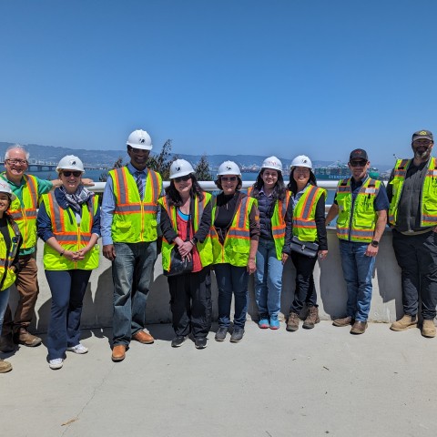Group shot with East Span in the background