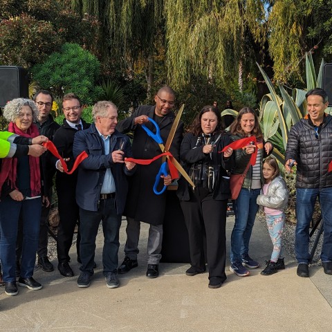 Group shot of electeds, city agency & community leaders at ribbon cutting 