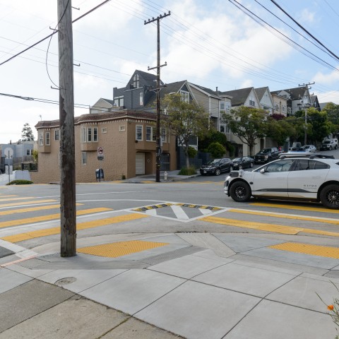 Autonomous Waymo vehicle on the road