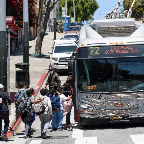 School children entering the bus on Fillmore Street