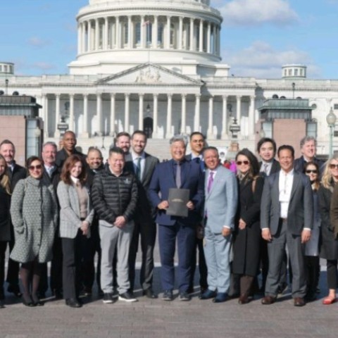 Group shot of DC advocacy delegation in front of the capitol 