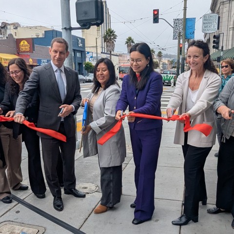 Group shot of ribbon cutting at the Mission & Norton streets intersection