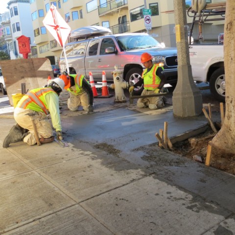 SF Public Works team making sidewalk repairs 